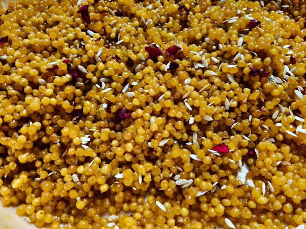Boondi Mithai served fresh with rose petals.
