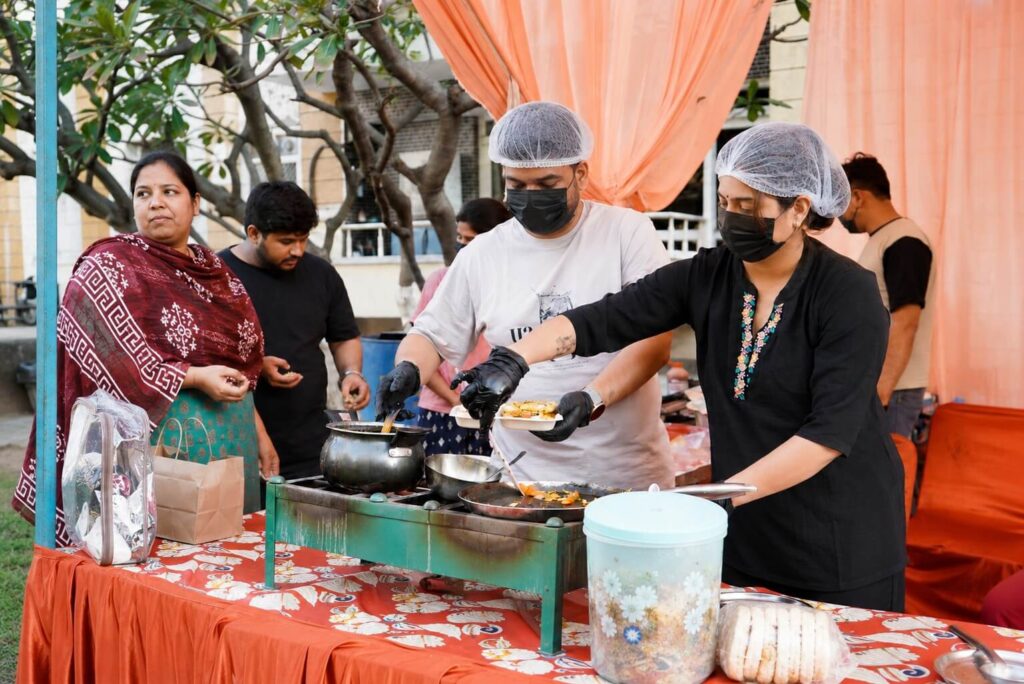 Indian catering: Professional caterers serving fresh food at an event in Zirakpur.